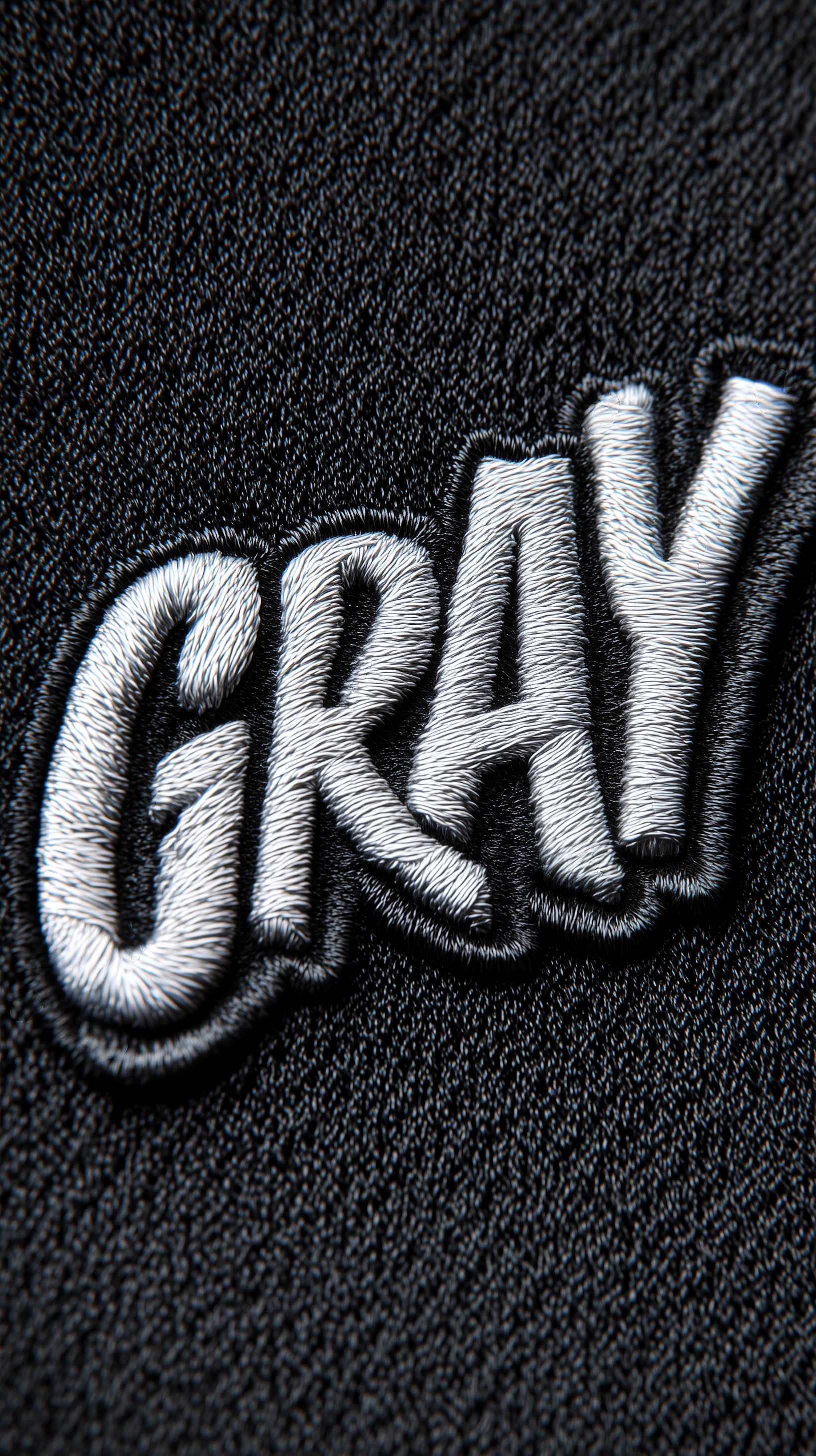 Midjourney prompt: photorealistic, top composition, silver color threads lettering "GRAY", on black...