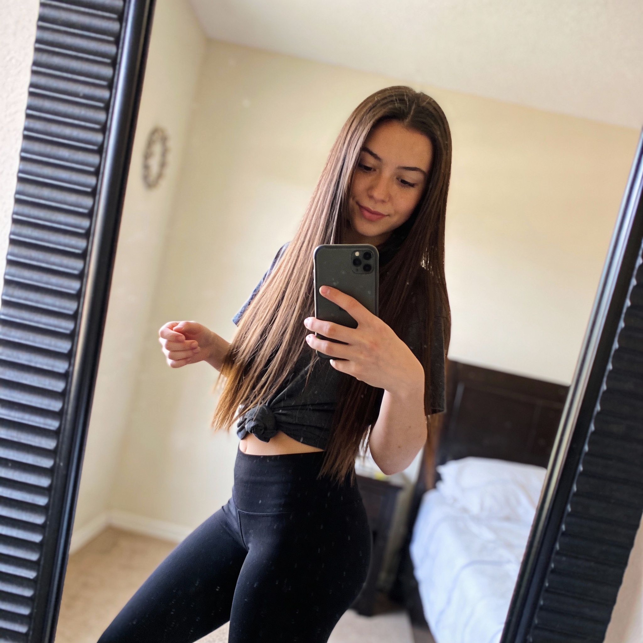 Seedream 4 prompt: the girl takes a photo with her phone of herself in the mirror, she has 24 years...