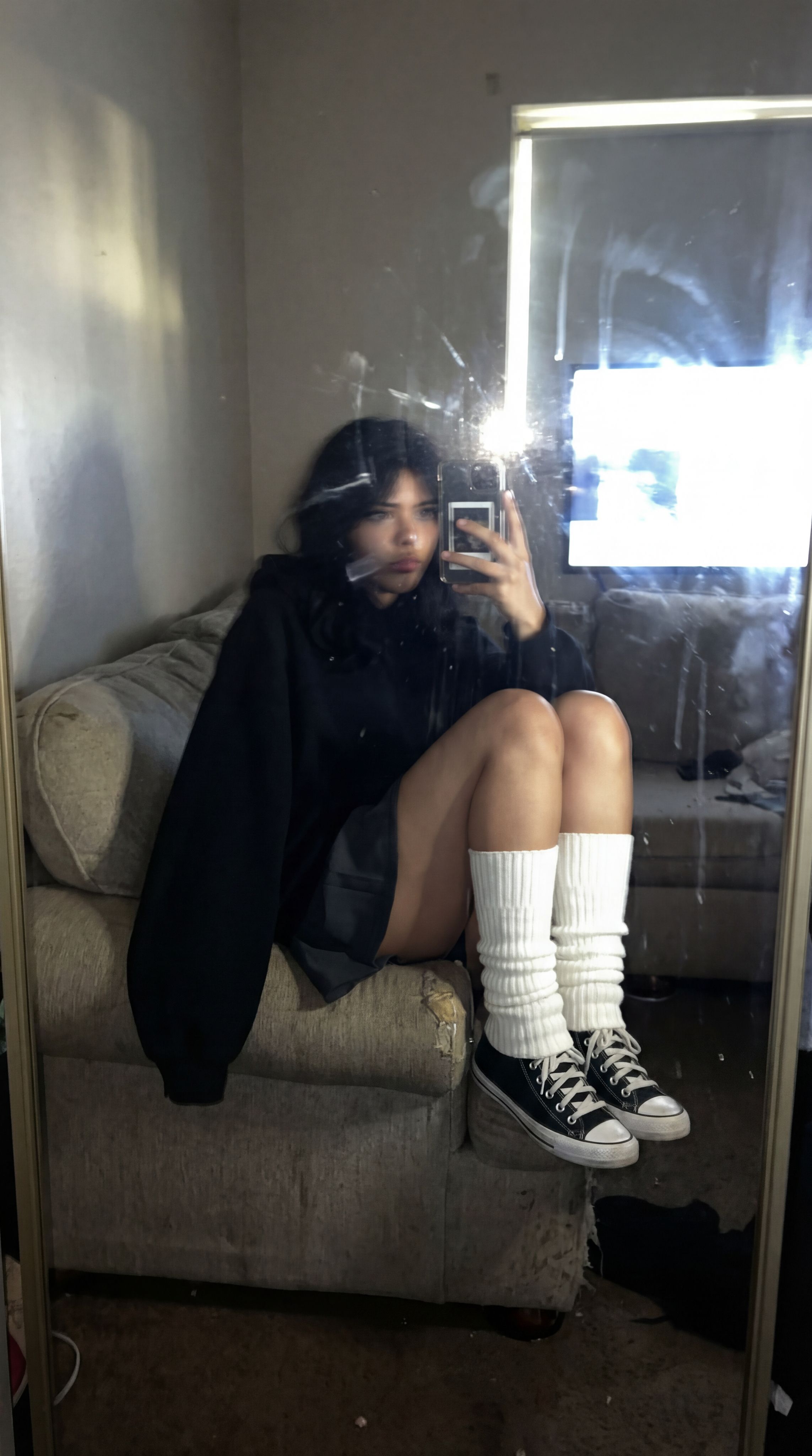 Nano Banana prompt: An extremely unremarkable iPhone mirror selfie photo with no clear subject or fr...